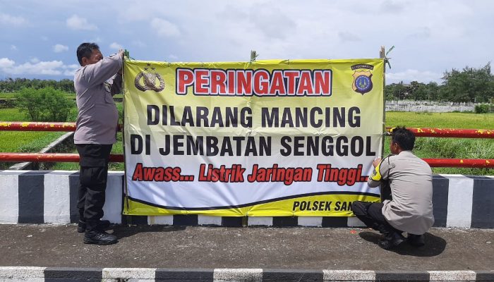 Polisi Pasang Banner Larangan Memancing di Area Jembatan Senggol